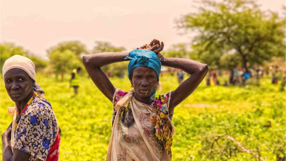 Two Sudanese women working on the fields.