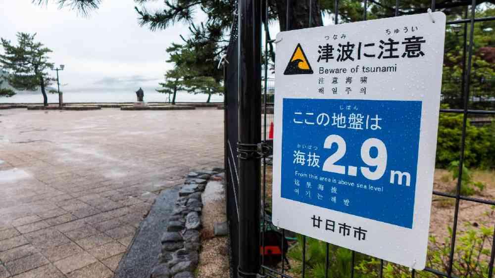 Tsunami warning sign, Miyajima Island, Japan