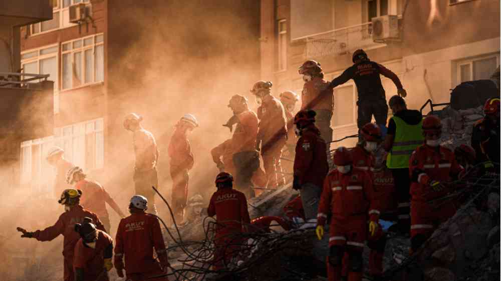 Group of people putting out fire