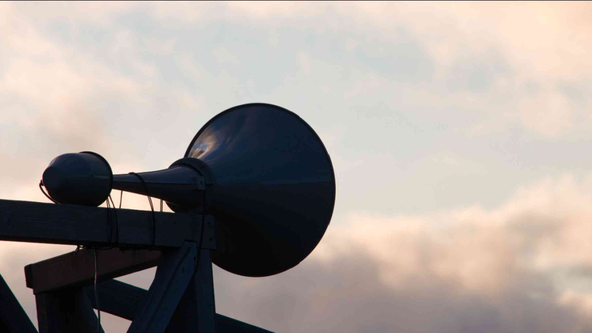 Early Warning system loud speaker with cloudy sky, Hokkaido Japan