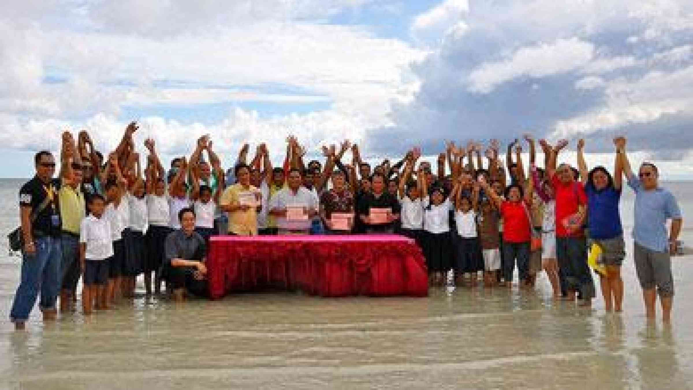 Photo by UNISDR. Mayors and children lead fight against climate change in the Philippines. https://www.flickr.com/photos/isdr/5257933430 CC BY-NC-ND 2.0