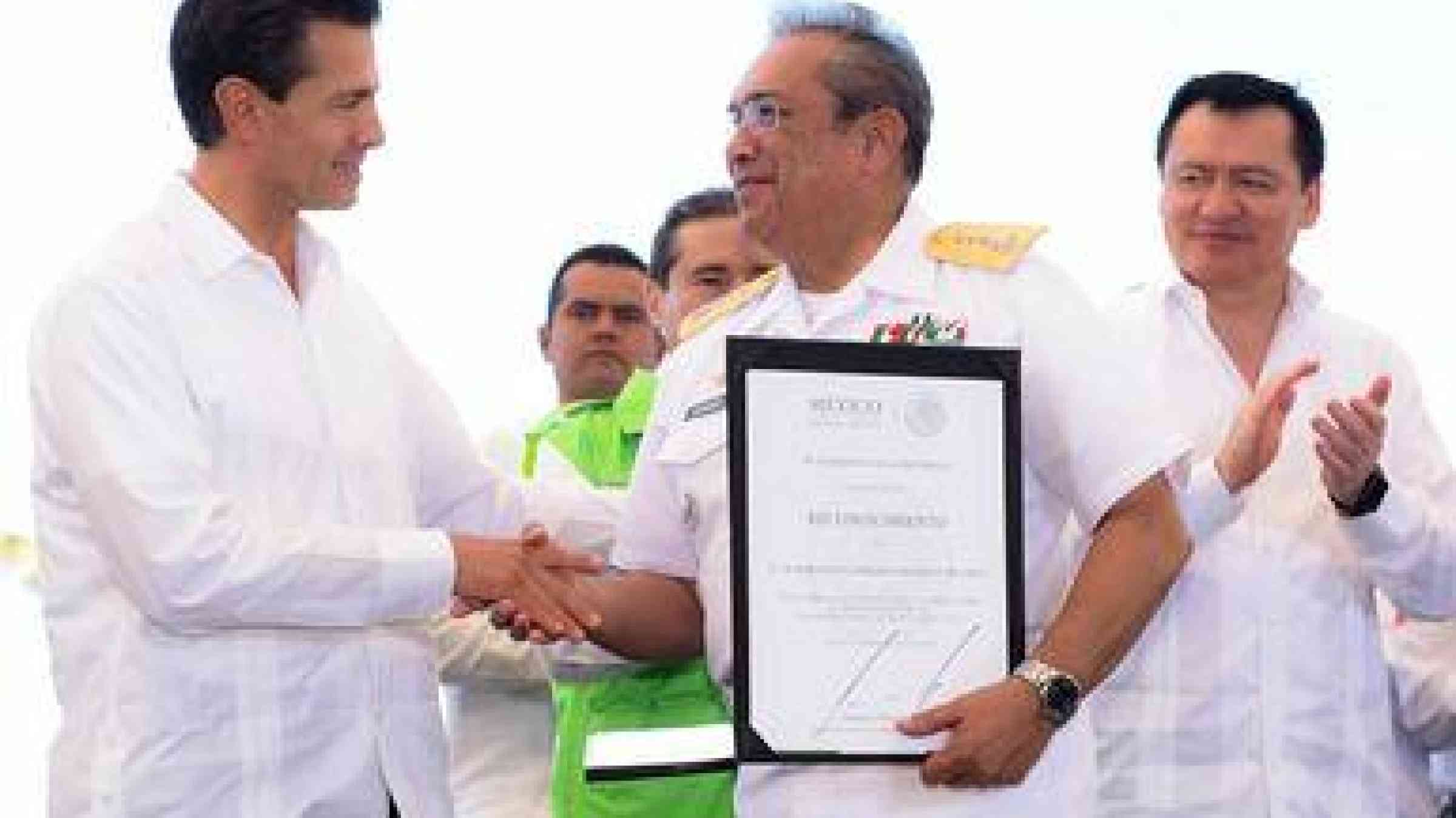 President of Mexico, Mr. Enrique Peña Nieto presenting awards at the 30th anniversary of the National System for Civil Protection