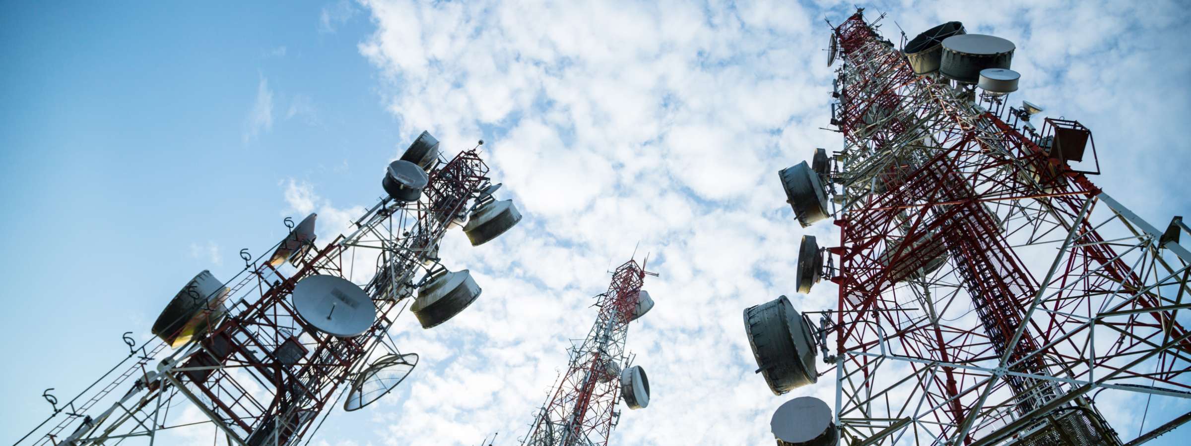 Telecommunication mast TV antennas wireless technology with blue sky in the morning